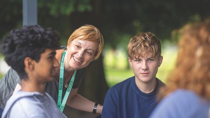 Staff with a group of teens